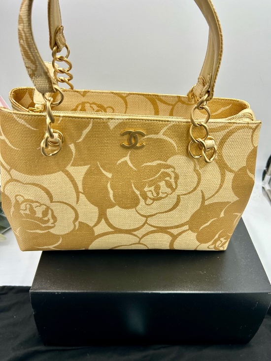 CHANEL Handbags - ****************Women’s Chanel Camellia Printed Raffia Chain Tote Bag.